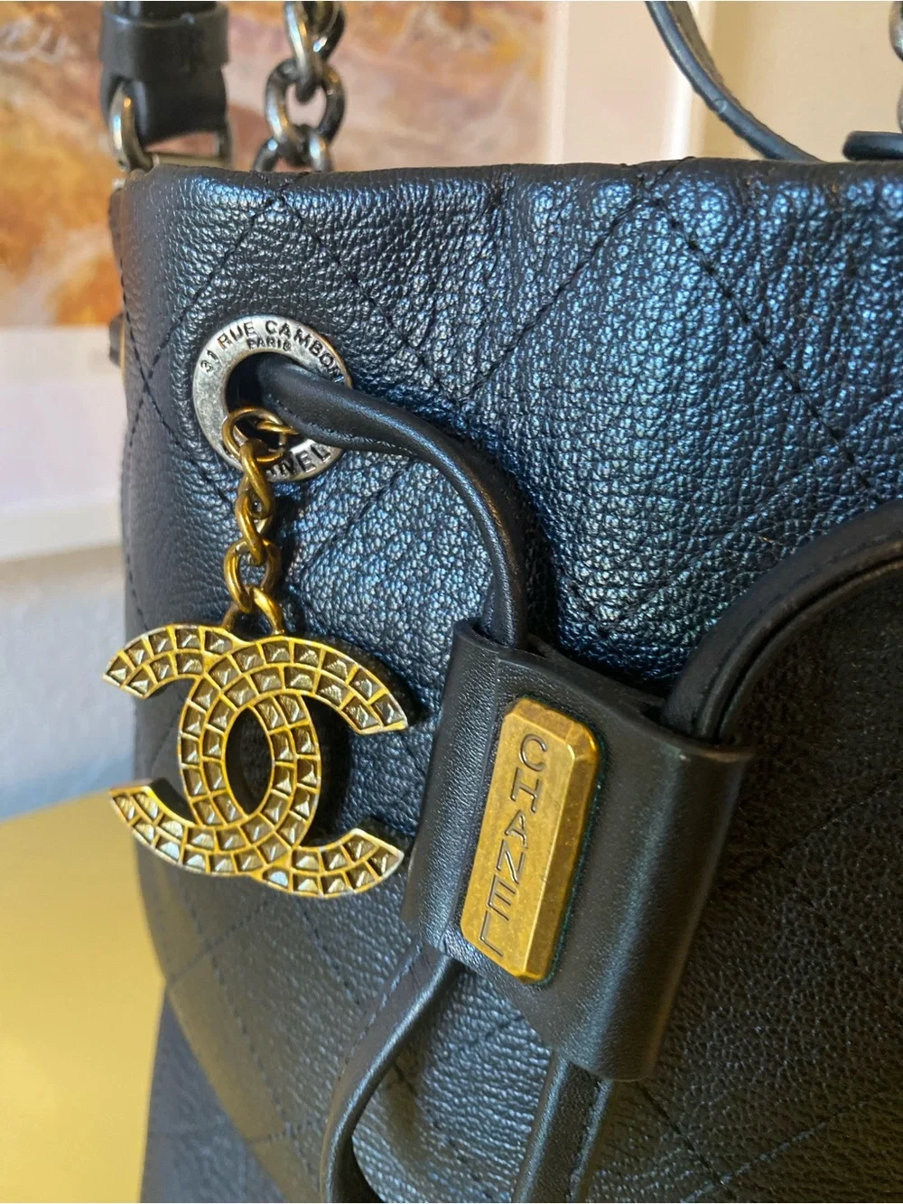CHANEL Black Quilted Leather Drawstring Bucket Bag with Mixed Hardware